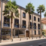 immobilier perpignan projection immeuble facade 3d avec des palmiers devant la résidence programme malraux