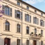 Programme immobilier Nimes en Monuments Historiques pour défiscaliser avec cette façade beige rénovée